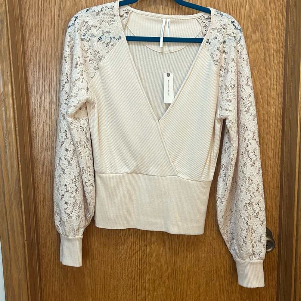 Anthropologie top with lace sleeves